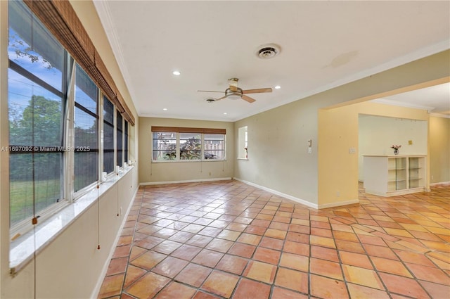 tiled spare room featuring crown molding and ceiling fan