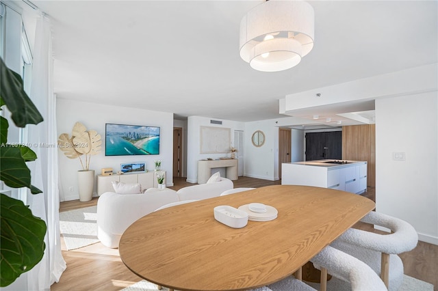 dining room featuring light hardwood / wood-style floors