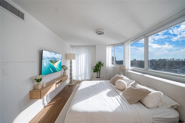 bedroom featuring wood-type flooring