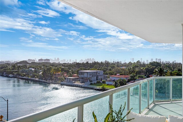 balcony featuring a water view