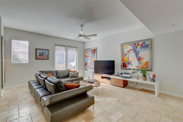 living room with ceiling fan