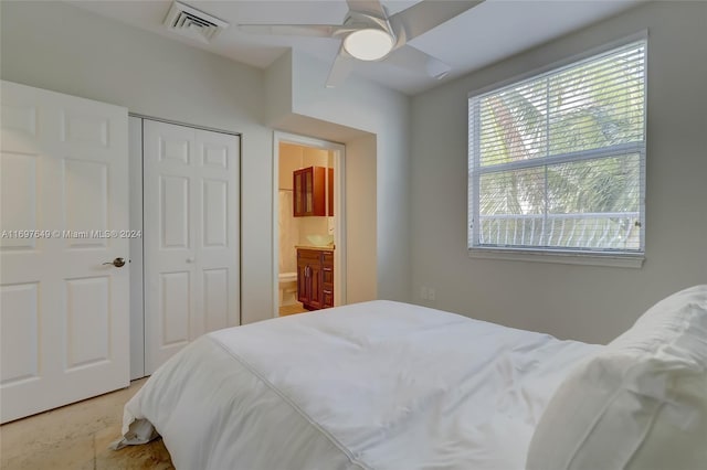 bedroom featuring ceiling fan and connected bathroom