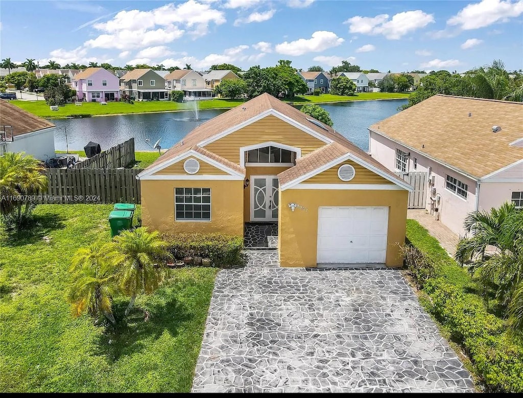 view of front of home featuring a water view and a front yard