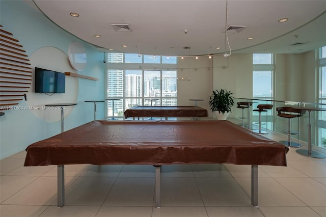 recreation room with light tile patterned floors and pool table