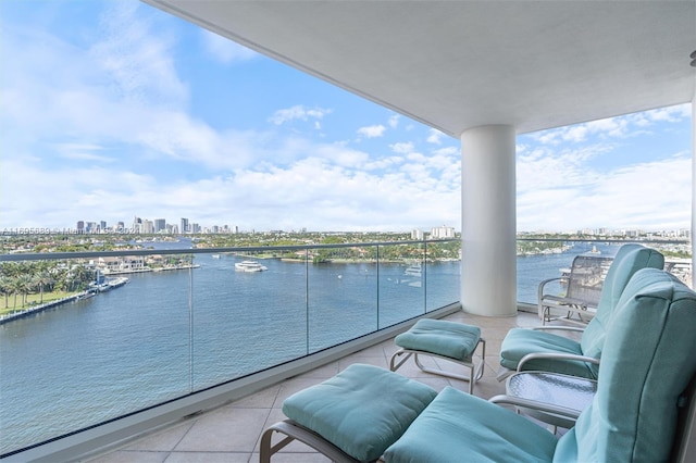 balcony featuring a water view