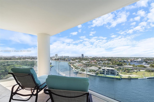 balcony featuring a water view