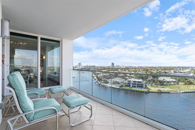 balcony featuring a water view