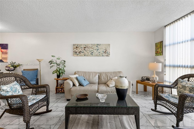 living room with a textured ceiling