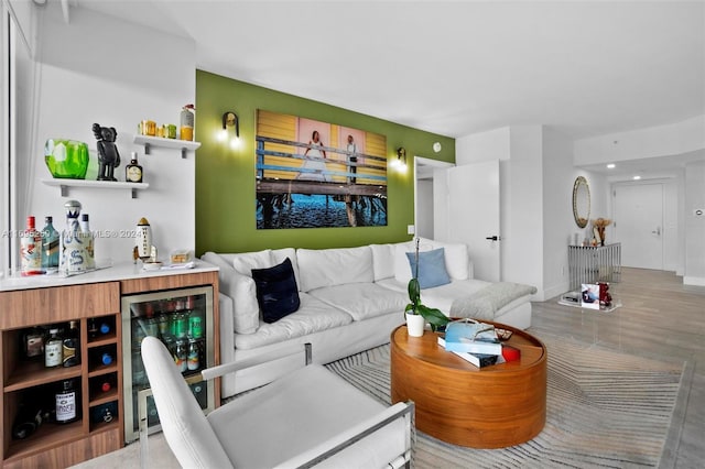 living room featuring bar and wine cooler