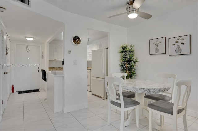 dining room featuring ceiling fan