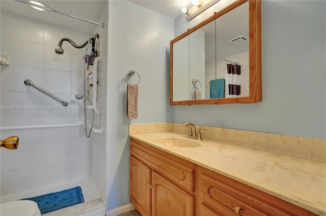 bathroom with a shower with curtain and vanity