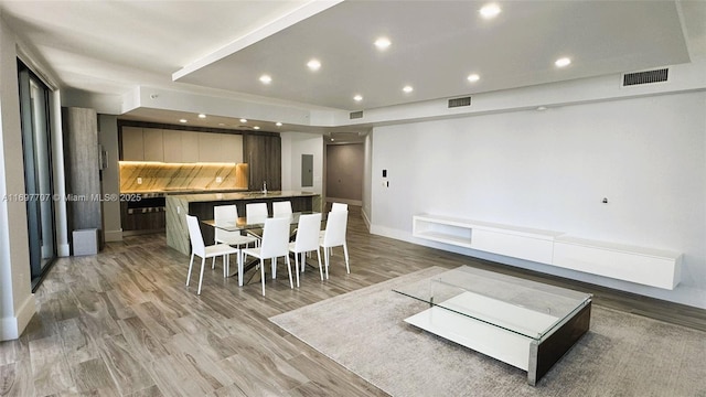 801 S Miami Ave Unit 3205/04, Miami, FL 33130 - dining area featuring light wood finished floors, visible vents, electric panel, and recessed lighting