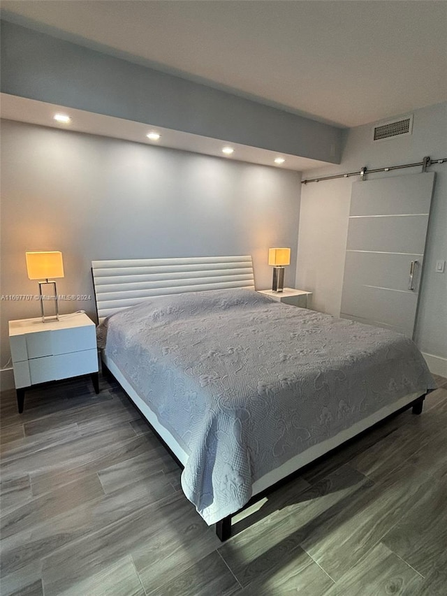 bedroom featuring wood-type flooring