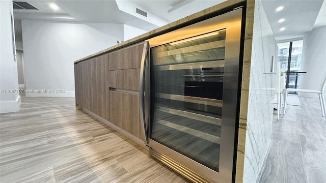 801 S Miami Ave Unit 3205/04, Miami, FL 33130 - interior details featuring recessed lighting, modern cabinets, light wood-style floors, and visible vents