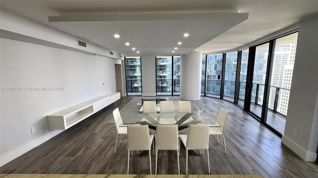 801 S Miami Ave Unit 3205/04, Miami, FL 33130 - unfurnished dining area with baseboards, expansive windows, visible vents, and wood finished floors