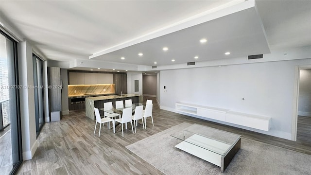 801 S Miami Ave Unit 3205/04, Miami, FL 33130 - dining area featuring light wood-style flooring, recessed lighting, baseboards, and visible vents