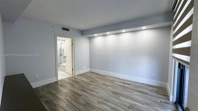 801 S Miami Ave Unit 3205/04, Miami, FL 33130 - interior space with wood finished floors, baseboards, a fireplace, and visible vents