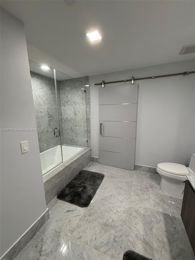 full bathroom featuring vanity, enclosed tub / shower combo, and toilet