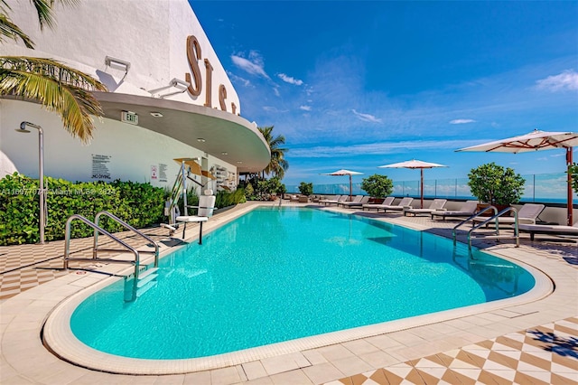 view of swimming pool featuring a patio