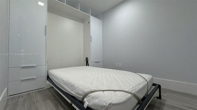 801 S Miami Ave Unit 3205/04, Miami, FL 33130 - bedroom with wood finished floors
