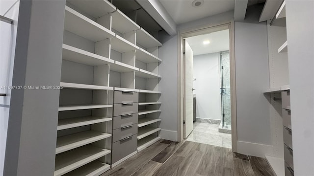 801 S Miami Ave Unit 3205/04, Miami, FL 33130 - spacious closet with dark wood-type flooring