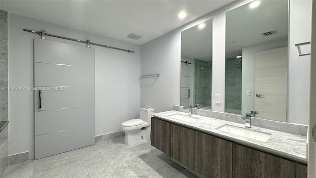 801 S Miami Ave Unit 3205/04, Miami, FL 33130 - bathroom with toilet, a sink, double vanity, and visible vents