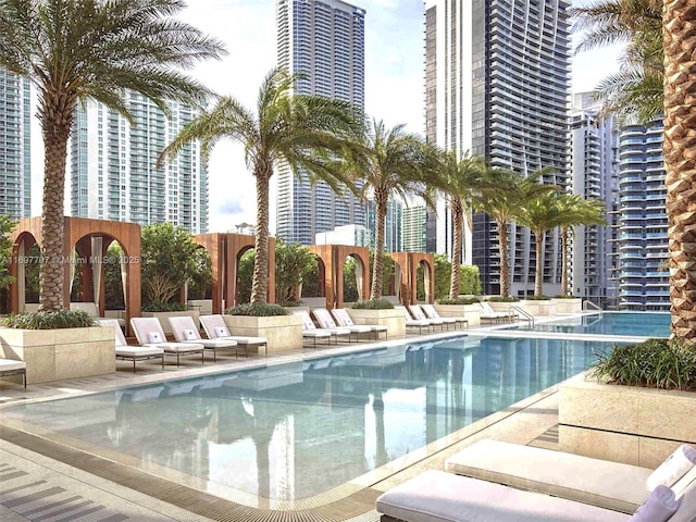 801 S Miami Ave Unit 3205/04, Miami, FL 33130 - community pool with a view of city, fence, and a patio