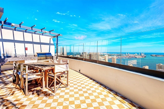 801 S Miami Ave Unit 3205/04, Miami, FL 33130 - view of patio with a grill, outdoor dining space, and a water view