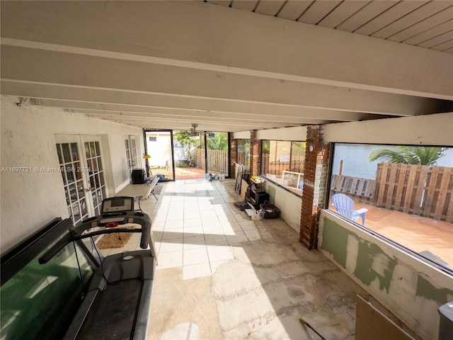 sunroom featuring french doors