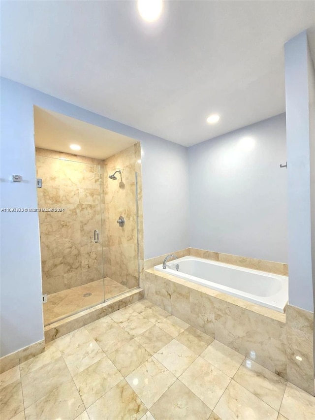 bathroom featuring plus walk in shower