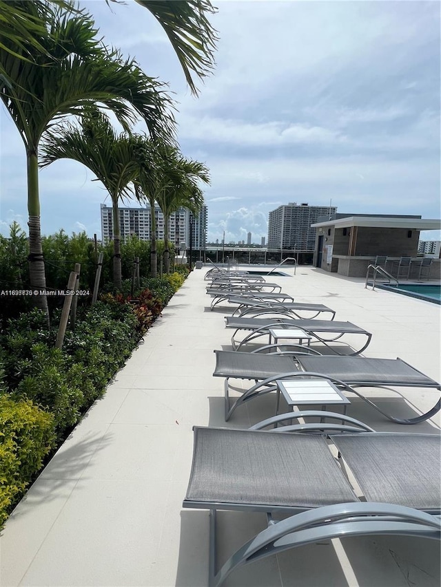 view of patio with a community pool