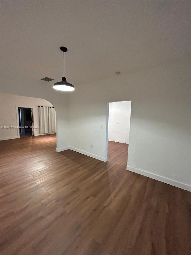 interior space featuring dark wood-type flooring