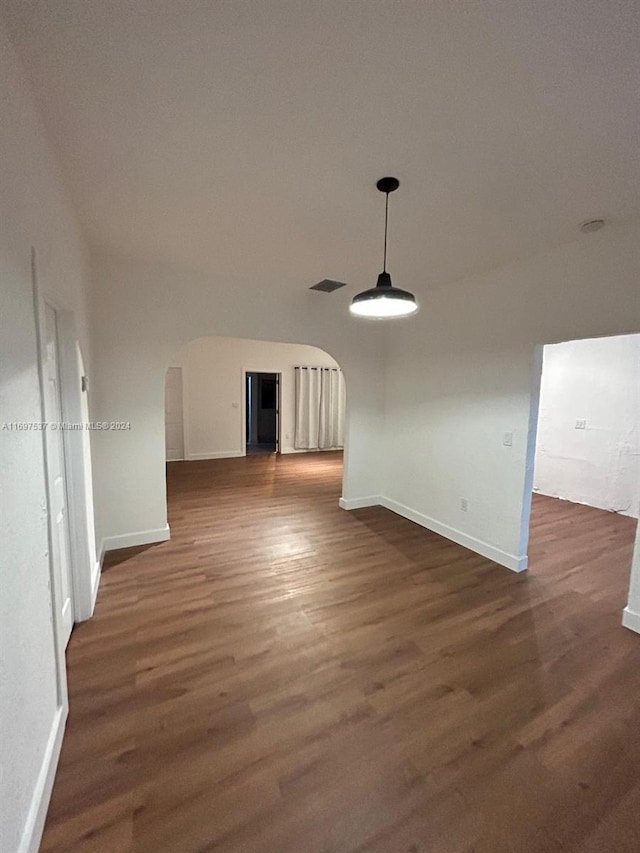 interior space with dark hardwood / wood-style floors