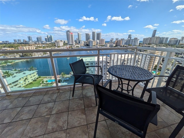 balcony featuring a water view