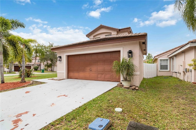 view of front facade with a garage and a front lawn