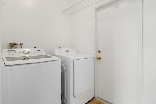 laundry area featuring separate washer and dryer