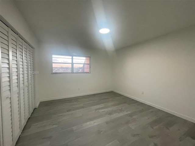 spare room featuring hardwood / wood-style floors