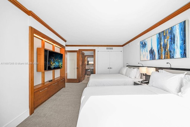 bedroom featuring light colored carpet and ornamental molding