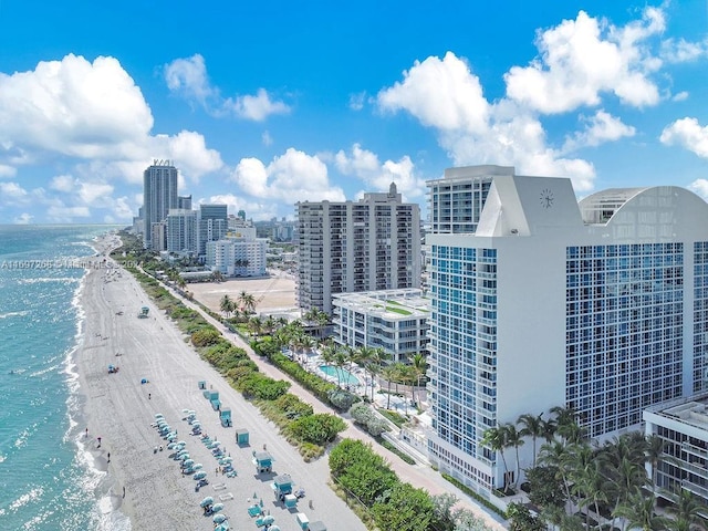 drone / aerial view with a view of the beach and a water view