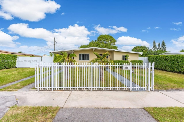 view of front of house with a front lawn