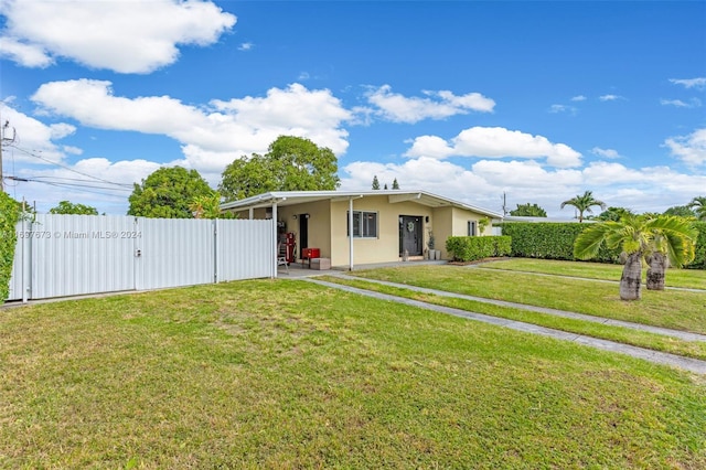 view of front of property with a front lawn