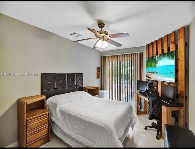 bedroom with ceiling fan and light tile patterned floors