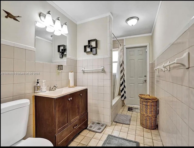 full bathroom with toilet, tile patterned floors, tile walls, and crown molding