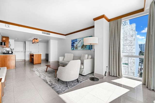 living room with a wall of windows and ornamental molding