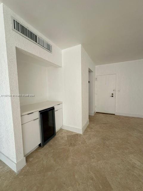 kitchen featuring white cabinetry