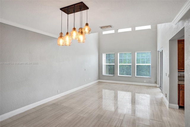 unfurnished room with ornamental molding