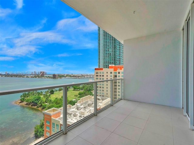 balcony featuring a water view