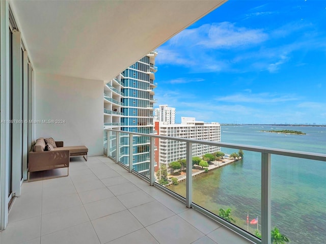 balcony featuring a water view