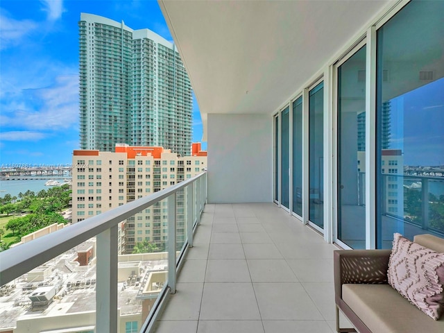 balcony featuring a water view