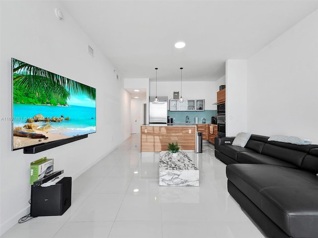 living room featuring light tile patterned floors